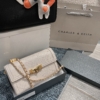 Túi Charles & Keith CNK Tallulah Quilted Lock Clutch 7 Túi Clutch nấp gập Tallulah Quilted Màu Trắng