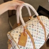 Túi Trống Louis Vuitton LV Monogram Vanilla Brown Size 50 M25233 17 tui trong du lich louis vuitton lv monogram trang nau