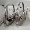 Túi CNK Dáng Cong Tròn Màu Bạc 24 Túi Charles & Keith Silver