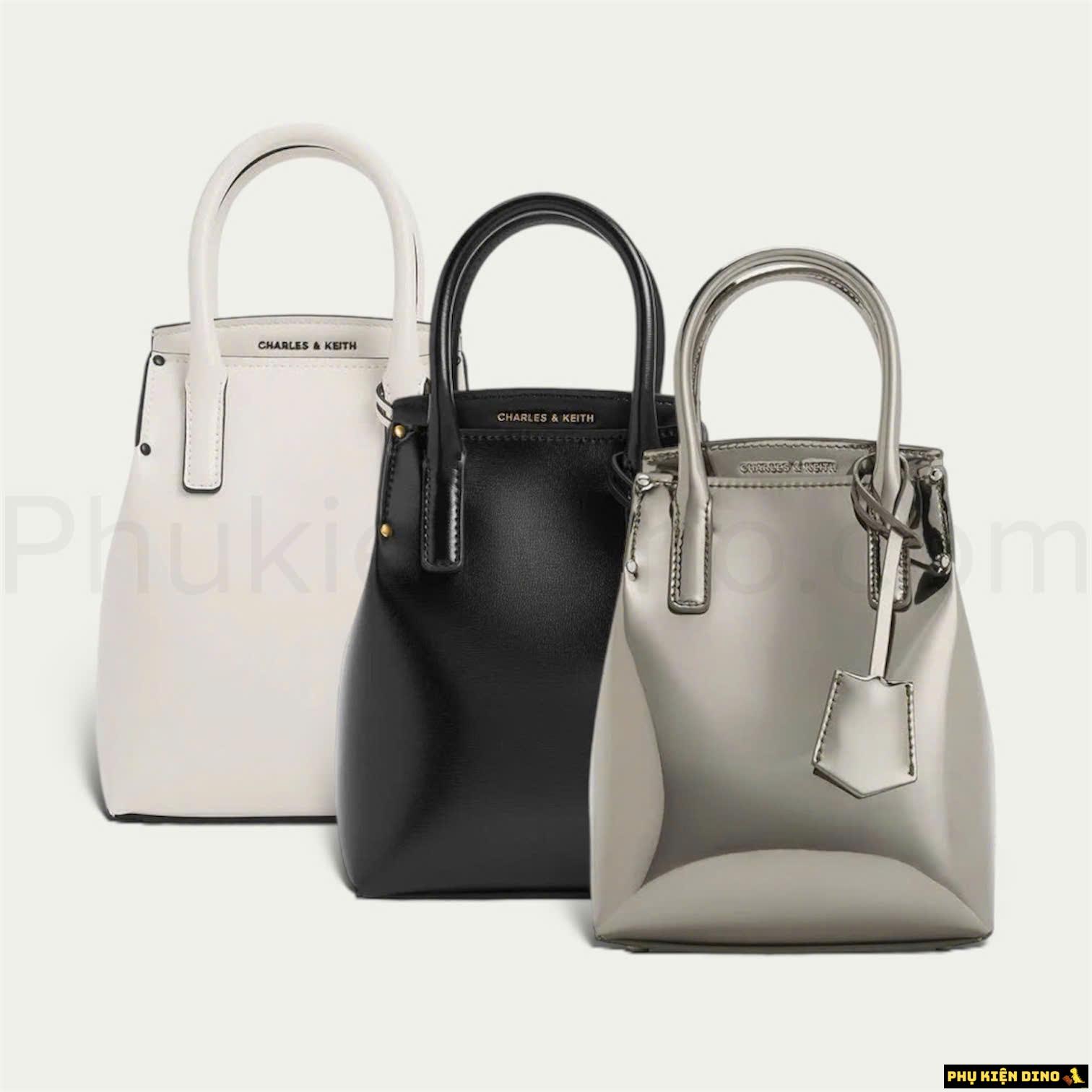 Túi Đeo Chéo Chữ Nhật CNK Rene Elongated Trắng Đen Bạc 1 Túi Đeo Chéo Chữ Nhật CNK Rene Elongated Trắng Đen Bạc