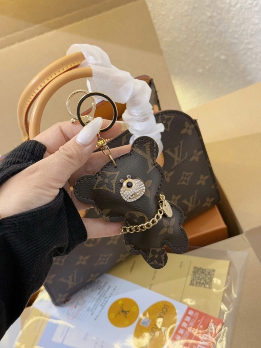 gau kem theo tui cong so lv louis vuitton brown