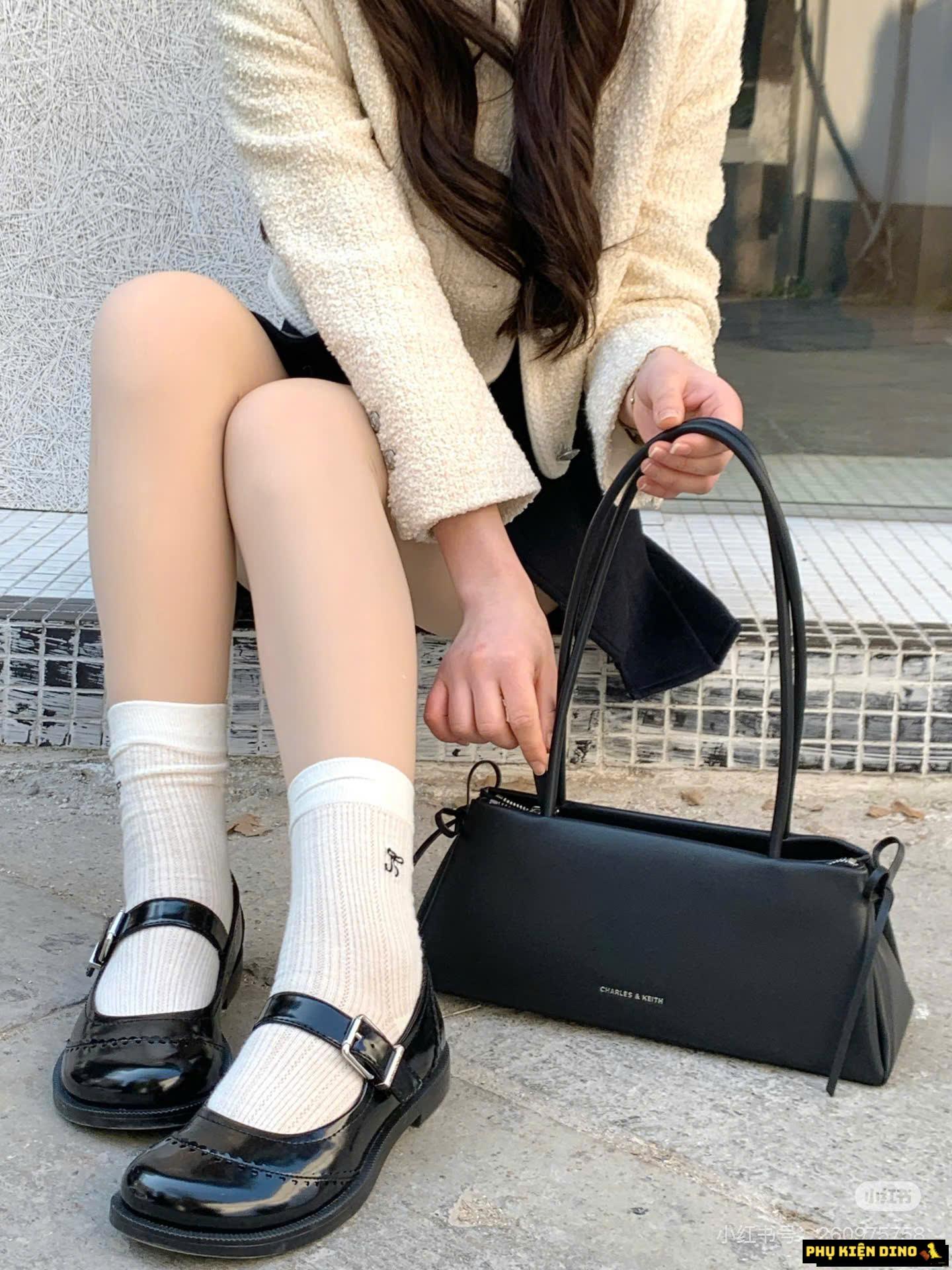 Túi Charles & Keith CNK Hazel Bow Elongated Trapeze Shoulder Bag Black Túi Charles & Keith CNK Hazel Bow Elongated Trapeze Shoulder Bag Black
