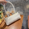 Túi Charles & Keith CNK Hazel Bow Elongated Shoulder Bag 23 Túi Charles & Keith CNK Hazel Bow Elongated Trapeze Shoulder Bag Meringue White