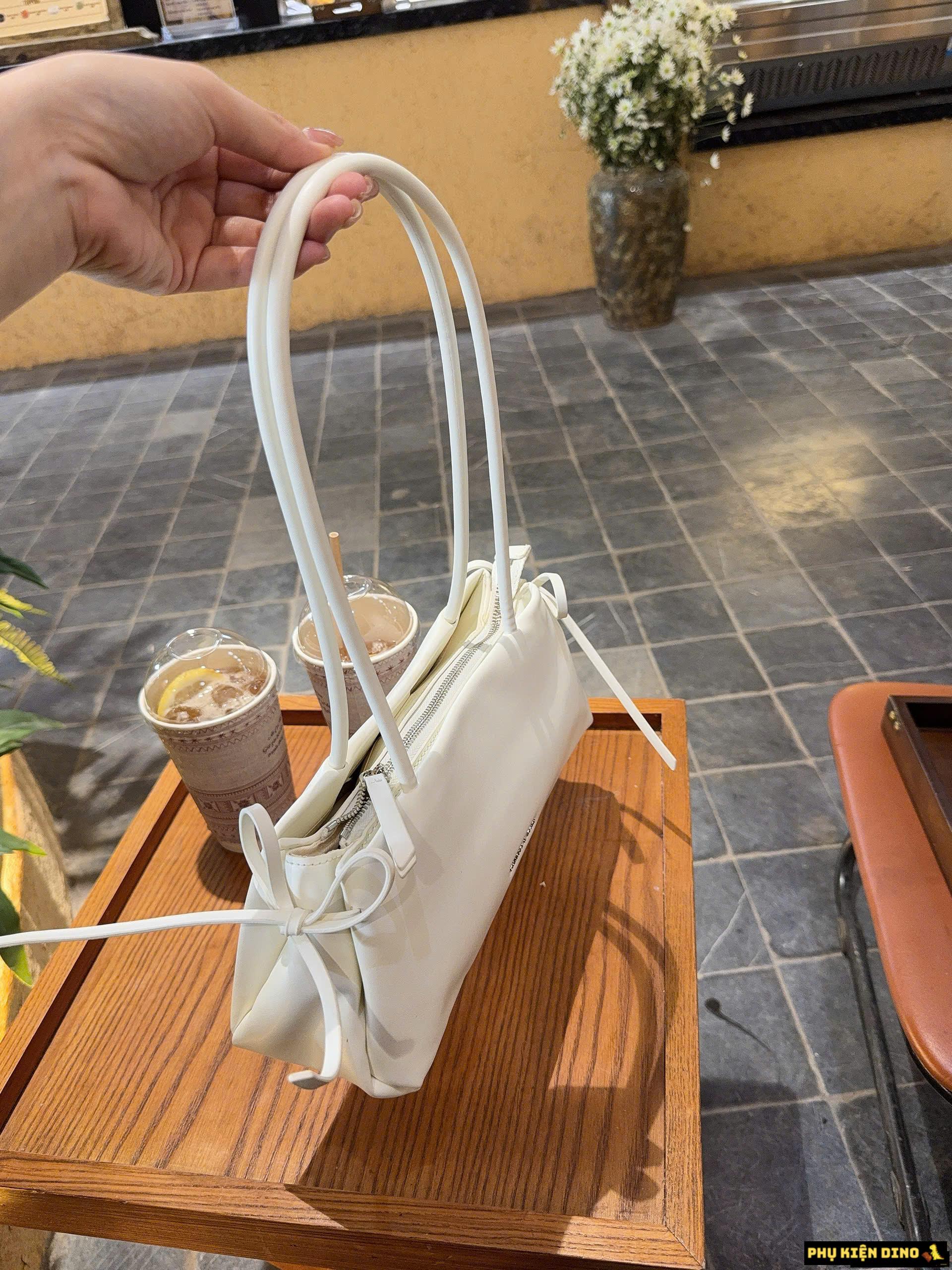 Túi Charles & Keith CNK Hazel Bow Elongated Shoulder Bag 10 Túi CNK Hazel Bow Elongated Trapeze Shoulder Bag White