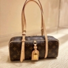 Túi Louis Vuitton LV Hang On Brown M47031 11 Túi Louis Vuitton LV Hang On