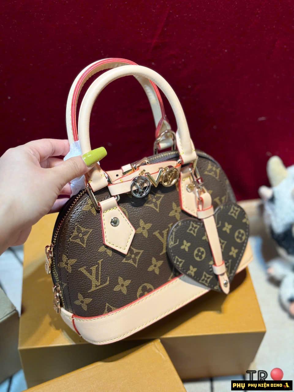Túi Xách Nữ Louis Vuitton LV Hến Alma BB Charm Heart Fullbox Size 20 8 Túi LV Hến Nâu Hoa Thị Size 20 Kèm Dây Xích Và Charm Tim