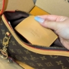 Túi Louis Vuitton LV Pouch Kẹp Nách Monogram Kèm Móc Cún Fullbox 23 Túi Louis Vuitton Pouch Kẹp Nách Monogram Canvas Hàng Vip Fullbox